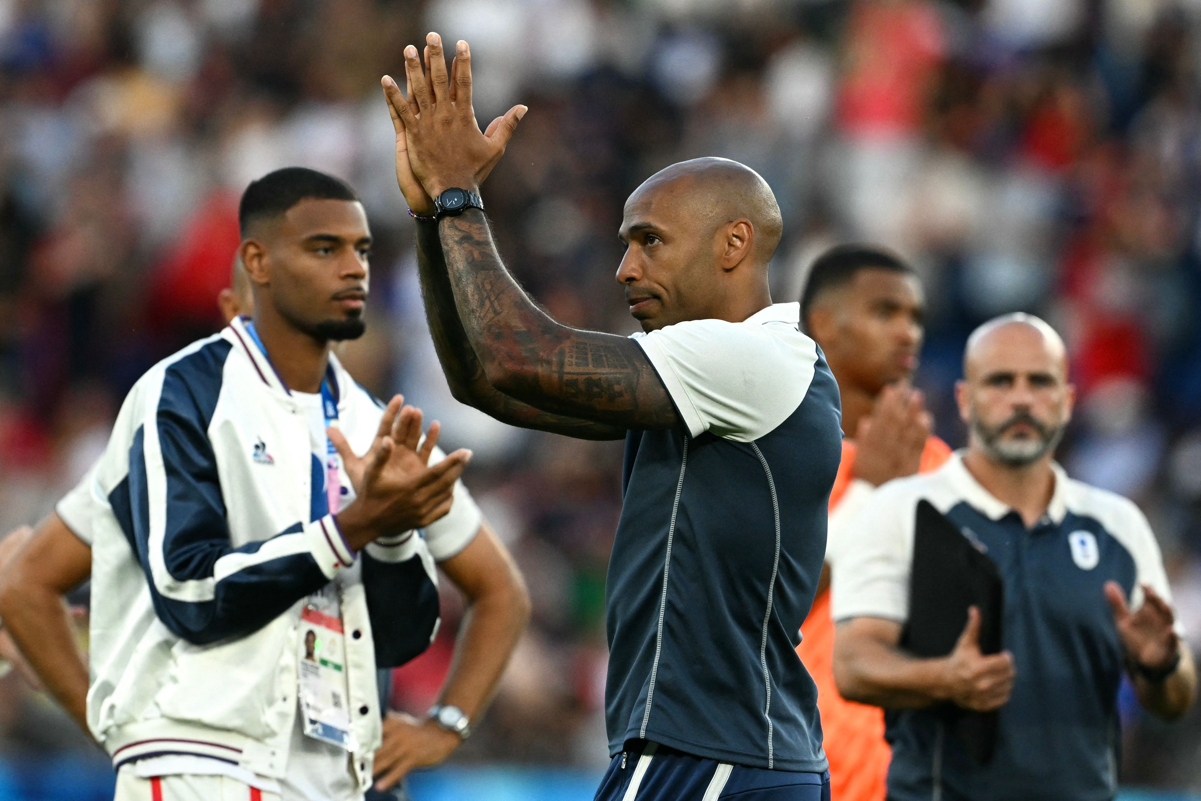 De retour à la lumière, «coach Henry» s'est révélé aux JO