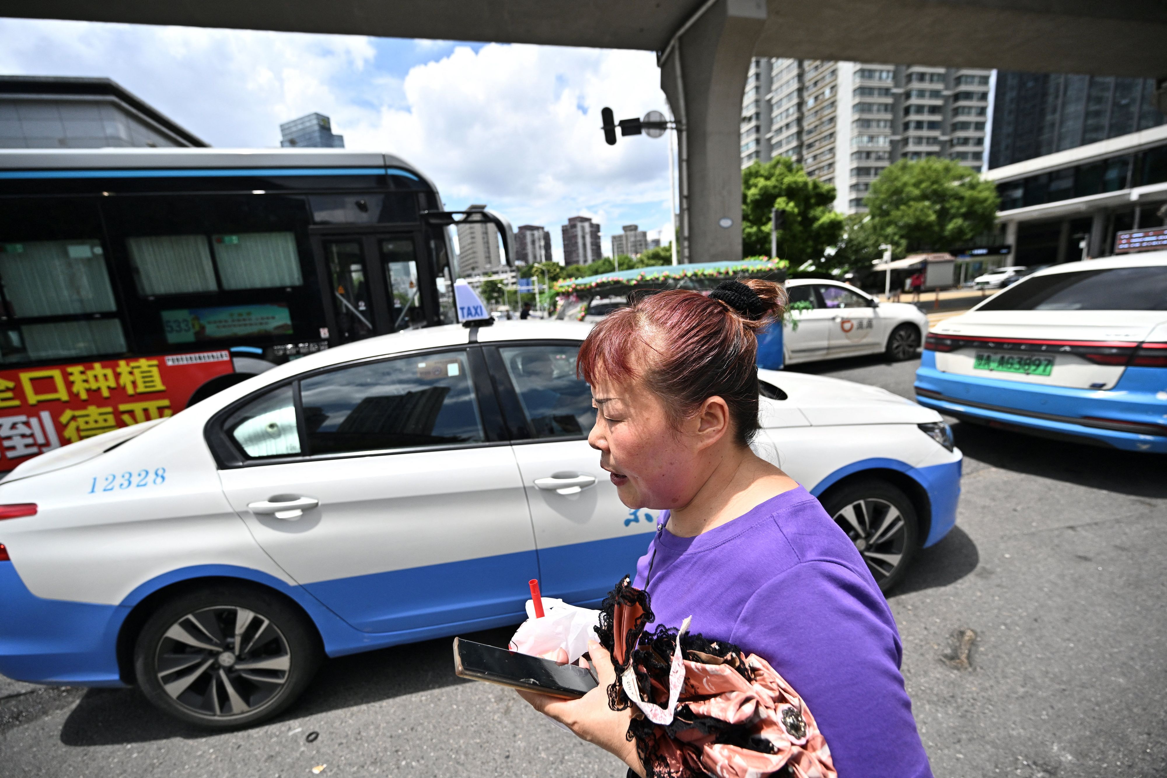 En Chine, les robotaxis fascinent et inquiètent