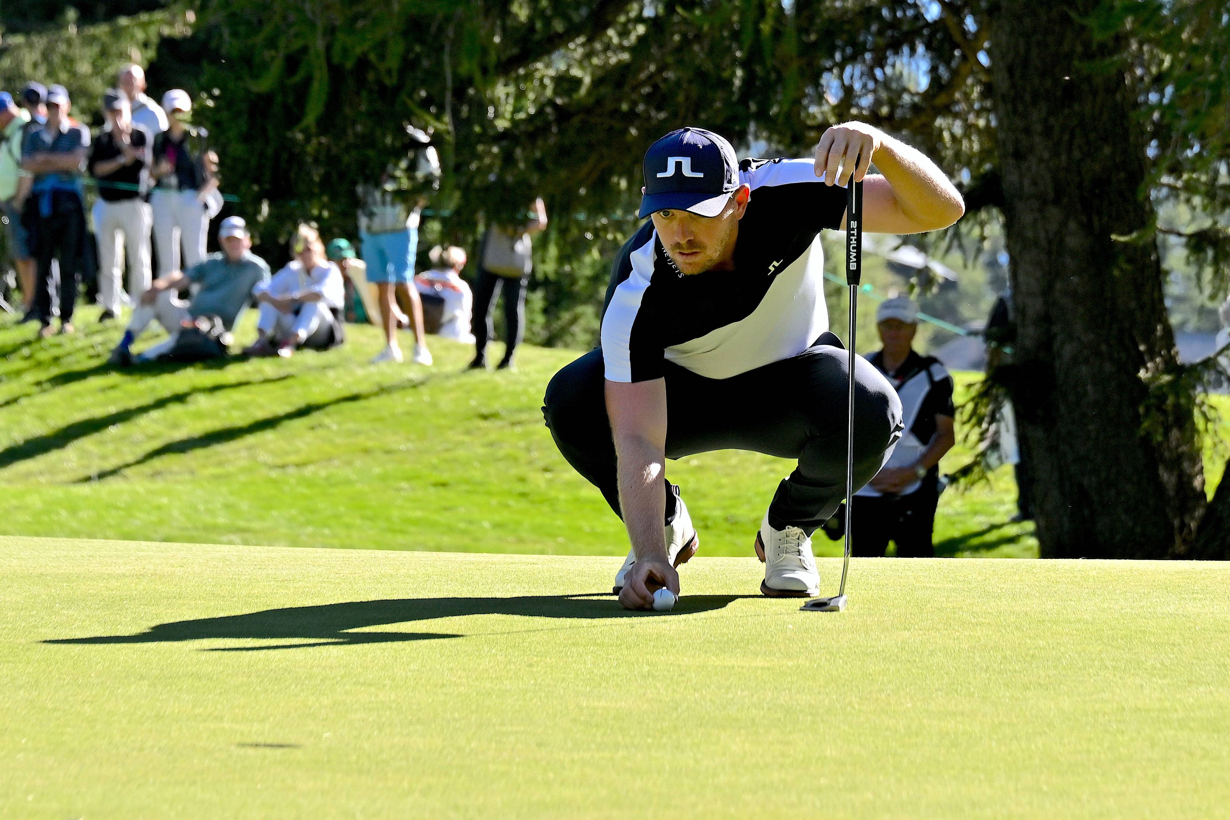 Le vent resserre les écarts à l'Omega European Masters